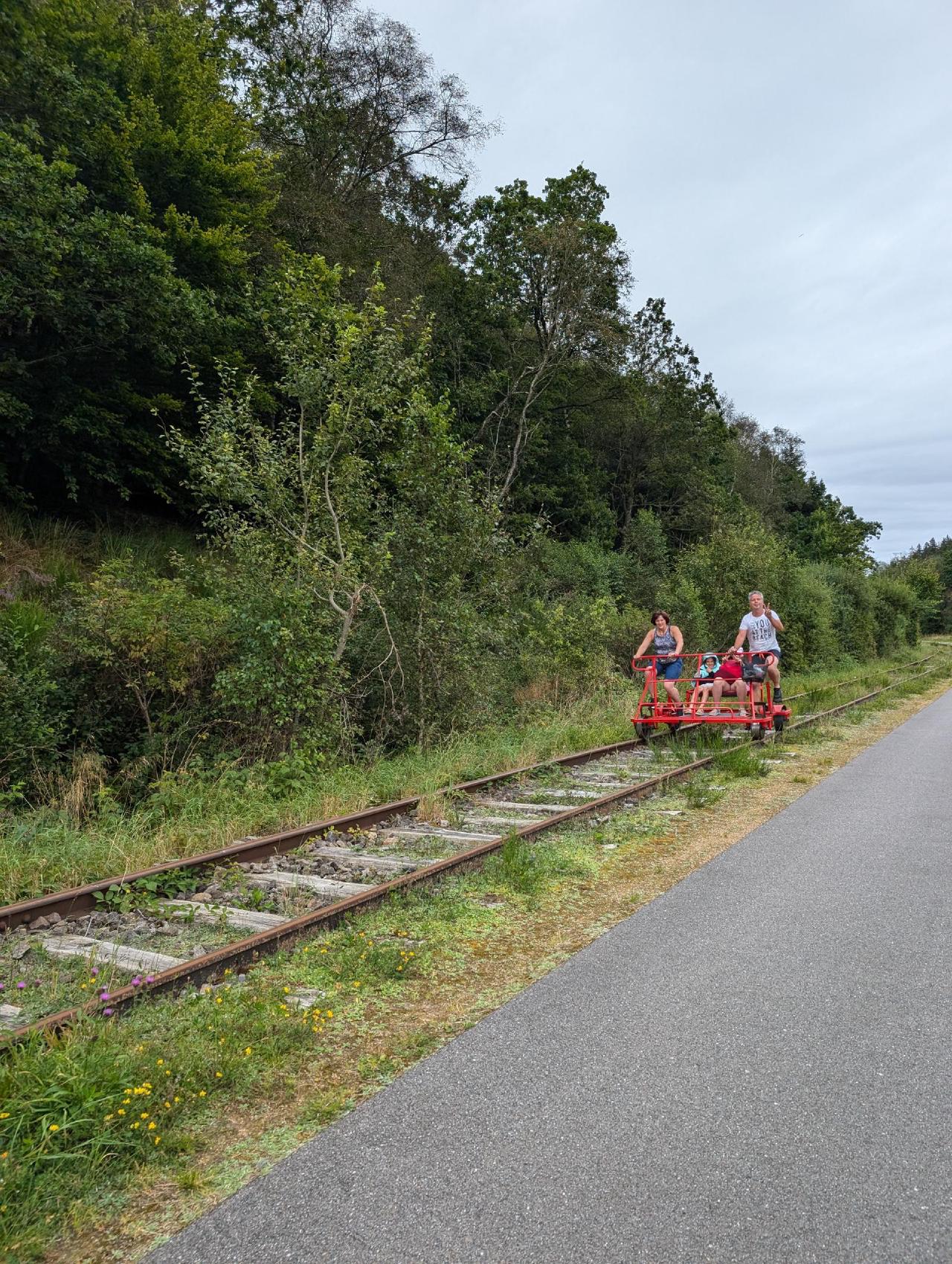 Happy folks on a railbike